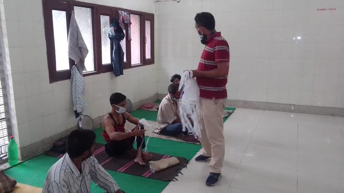 Citizens interacting with each other in a shelter for men