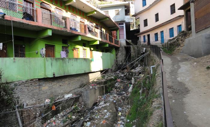With slapdash infrastructure and poor waste management, garbage chokes the landscape.