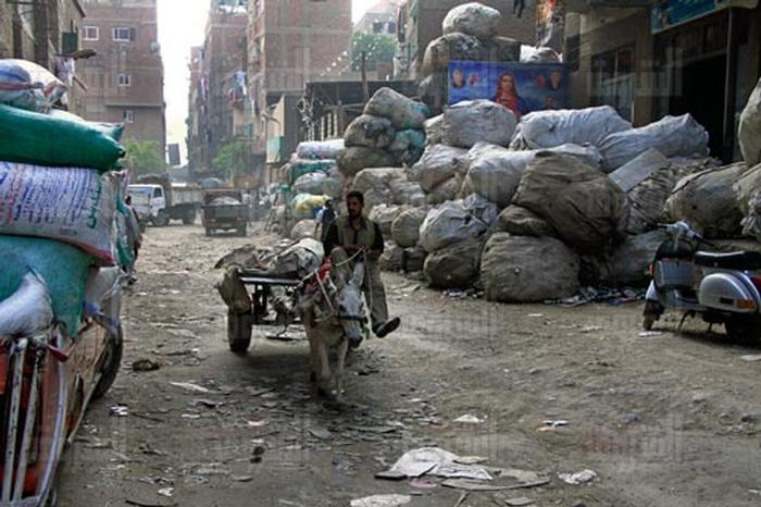 This picture shows the internal structure of the neighborhoods of the el-Zabaleen located in Mokattam. The picture is obtained from an article that highlights the need for internal development within the neighborhood. It also outlines how the neighborhood's landscape is not equipped to sustain the economic activities of the garbage collectors.