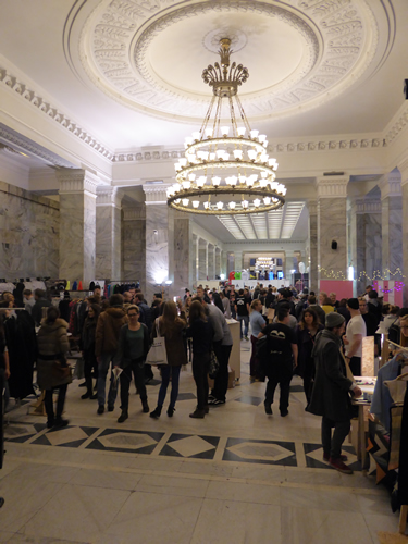 <strong>Christmas Market at the Palace of Culture and Science (PKiN), </strong>Warsaw, Poland.  Designed by Soviet architect <a href='https://en.wikipedia.org/wiki/Lev_Rudnev' title='Lev Rudnev'>Lev Rudnev</a> in what has been called the <a href='https://en.wikipedia.org/wiki/Seven_Sisters_(Moscow)'>"Seven Sisters"</a> (Stalinist) style, the 1955 building has survived post-Communist era calls for its demolition. It “houses various public and cultural institutions such as cinemas, theaters, libraries, sports clubs, university faculties and authorities of the <a href='https://en.wikipedia.org/wiki/Polish_Academy_of_Sciences' title='Polish Academy of Sciences'>Polish Academy of Sciences</a>.”  The building is slowly overcoming its history as a symbol of totalitarianism and has become a true community resource. See: <a href='https://en.wikipedia.org/wiki/Palace_of_Culture_and_Science'>https://en.wikipedia.org/wiki/Palace_of_Culture_and_Science</a>
