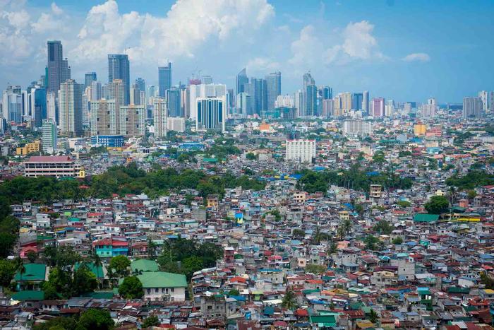 Highrise buildings in Manila creates inequity and forced the poor to fled at the edge of the city.